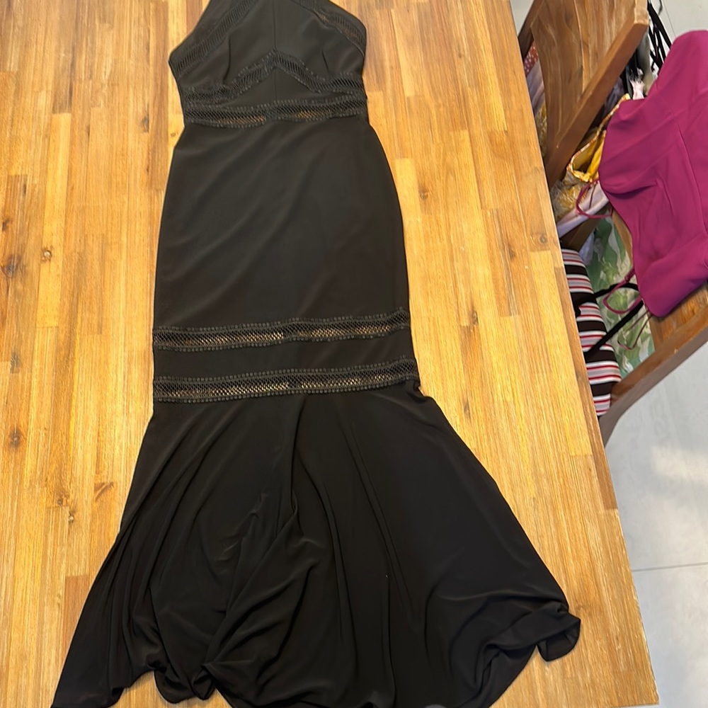 Elegant detail Aqua black gown.  Size 2 never worn no tags.